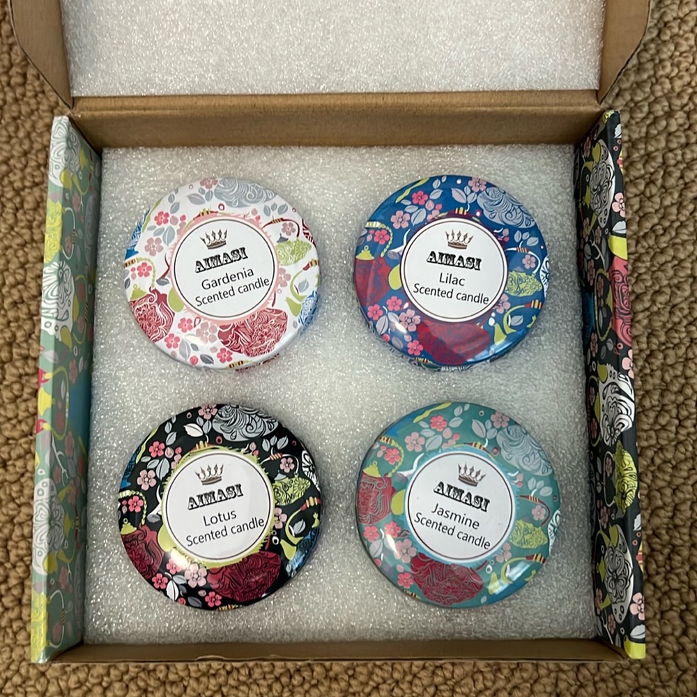 NWT, in box: Aimasi Aromatherapy Candles - Set of 4